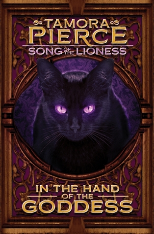 a black cat with purple eyes on the cover of fantasy book